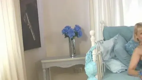 MILF in blonde bob uses vibrator on couch, full nude scenes