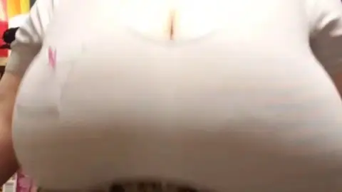 Mature brunette with big tits bouncing in bathroom, rainbow flag on sh