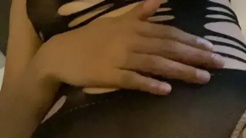 Asian brunette jerking off on bed, POV close-up