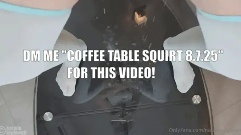 Slim brunette spreads on table, nipples showing through top