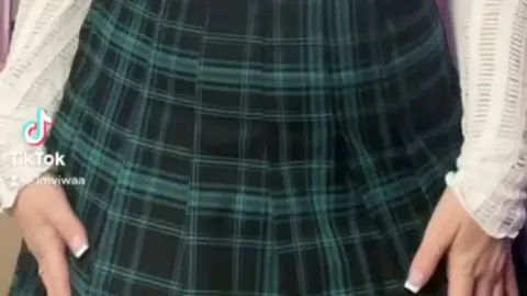 webgirl – Girl in Plaid Skirt Shows Nipples in Bedroom