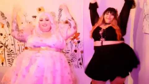 Two curvy blondes and brunettes dance before getting into girl-on-girl