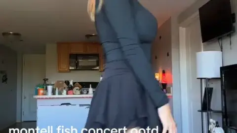 Blonde in living room with dog, casual home video vibes