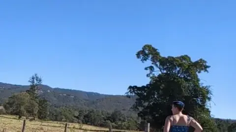 kitthebeefcake blue dress butt flash outside