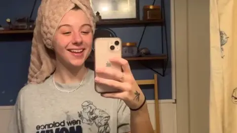 Slime brunette in towel bathroom selfie series