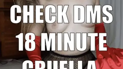 Brunette in white fur teases before going topless in living room