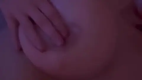 Curvy white girl gets hand job and oral in purple-lit bedroom