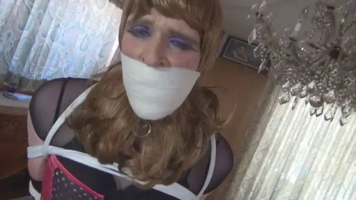 TranniesInTrouble dani pink corset gagged lrg
